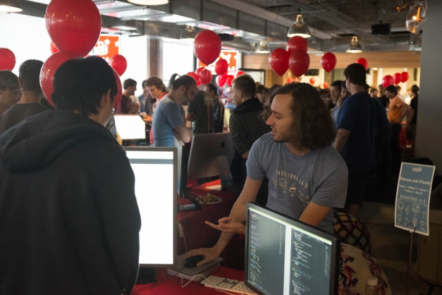 Our hackers showing off their projects in a science fair style exhibition